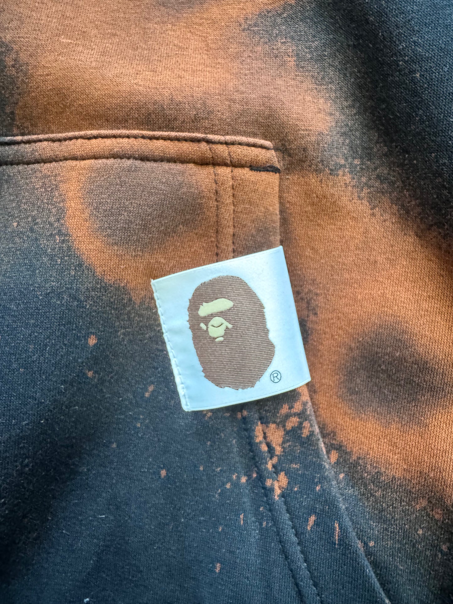 felpa Untold.® x Bape pocket wallet tyedye black hoodie sp26-005